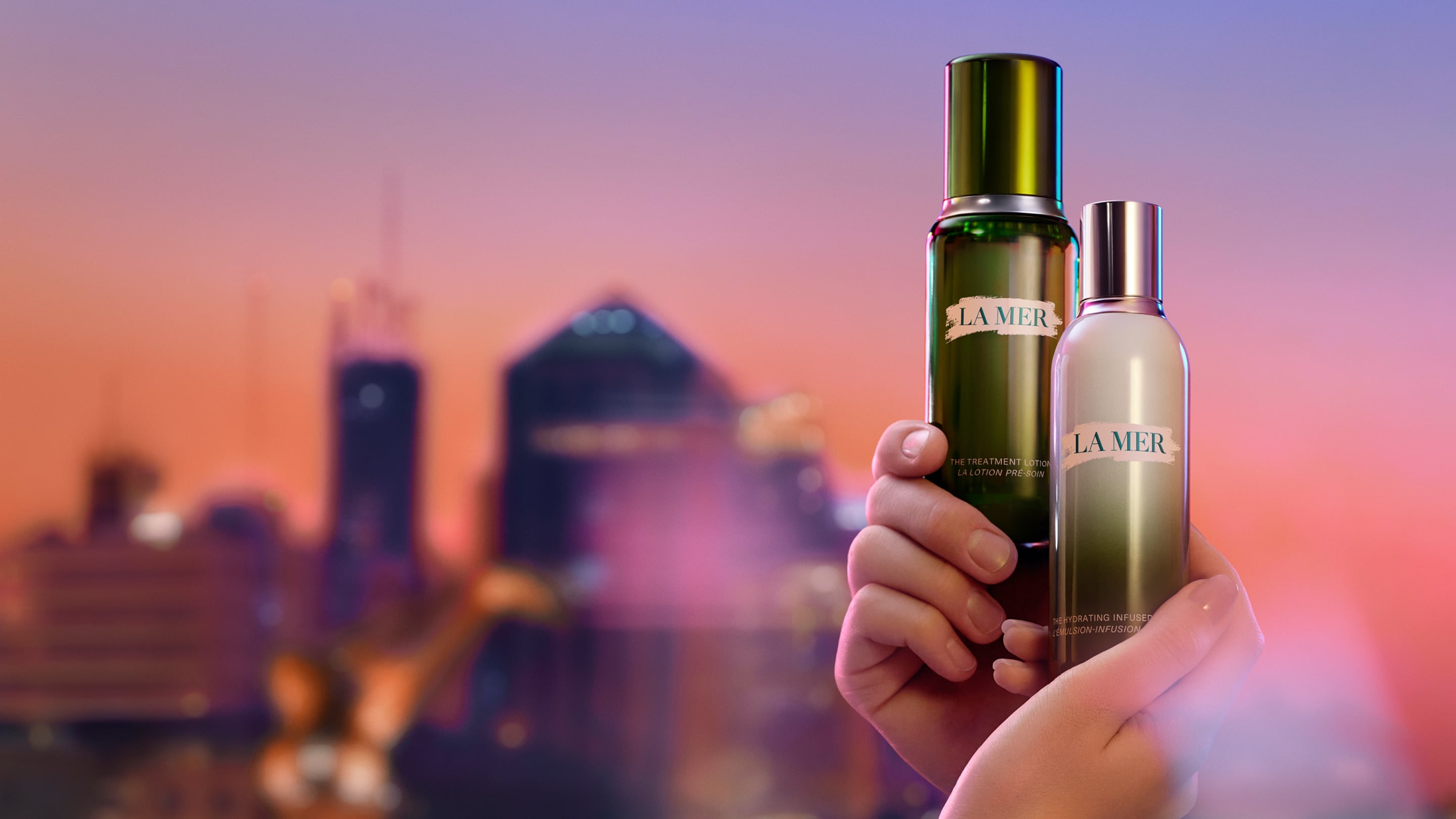 Selection of bestselling La Mer products placed on a festive, grand staircase, decorated in miniature masquerades and headwear